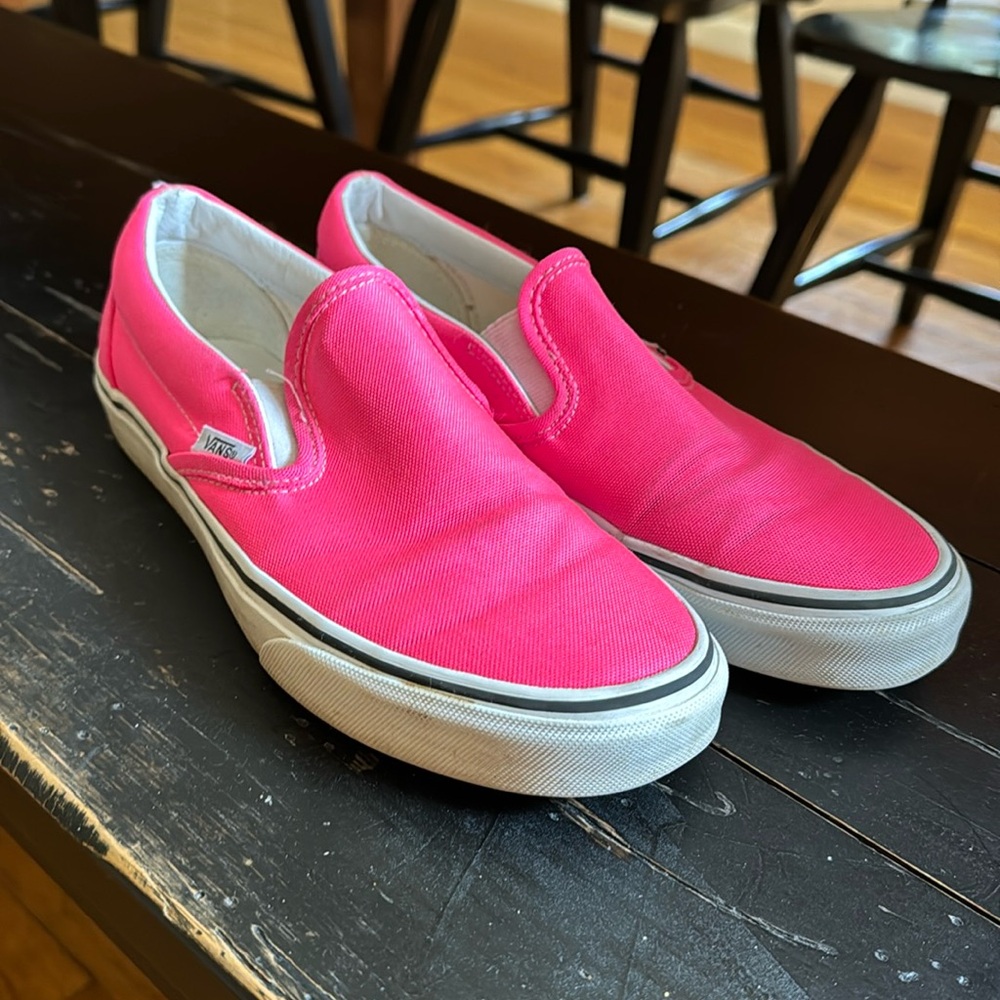 Hot pink neon slip on Vans